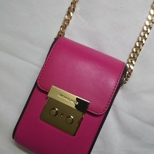 Michael Kors raspberry colored purse
